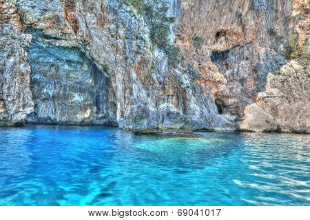 Blue Water By The Cave