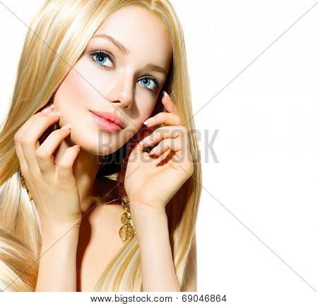 Beautiful Blond Girl isolated on a White Background. Blonde Long Smooth Healthy Hair. Beautiful Young Woman with blue eyes and professional makeup. Portrait