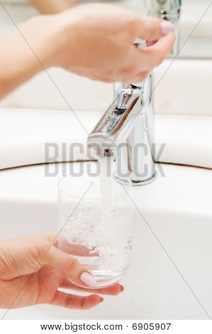 Water Running In Glass