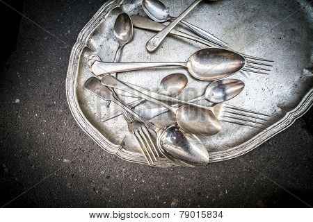 Vintage Spoons, Teaspoons And Forks On A Silver Tray.