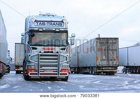 Fleet Of Scania Trailer Trucks On Wintry Icy Yard