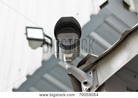Cctv Security Camera At The Wall