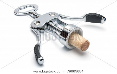 The metal chrome lever-type corkscrew with stopper isolated on white.