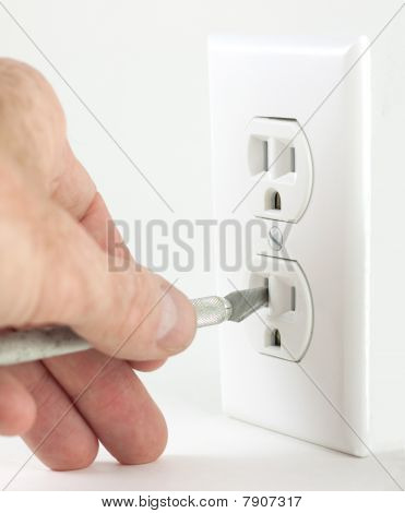 Craft Knife In Electrical Outlet