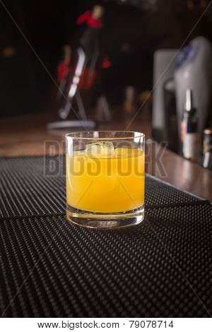Screw Driver Cocktail On A Bar Ribber Mat