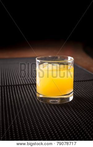 Screw Driver Cocktail On A Bar Ribber Mat