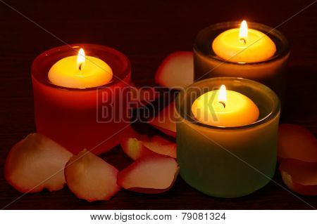 Glass Candlesticks And Rose Petals.  Selective Focus On The Right Candle