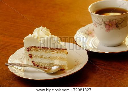 Sweet Cake With Cup Of Tea