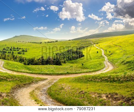 Cross Road On Hillside Meadow In Mountain At Sunrise