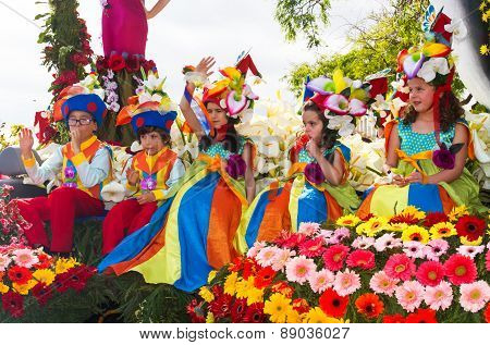 FUNCHAL MADEIRA - APRIL 20 2015: Children in floral costumes at the Flower Festival Parade Funchal M