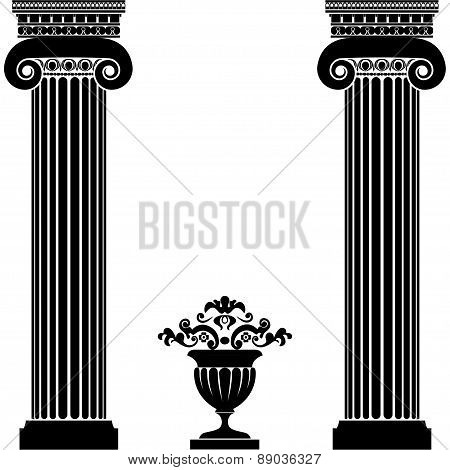 Classical greek or roman columns and vase