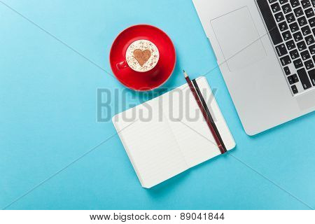 Cappuccino And Note Near Laptop