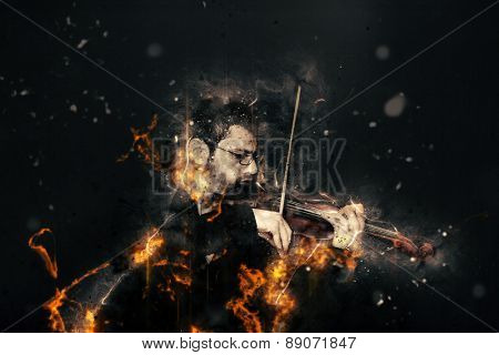 the violinist: Musician playing violin on dark background
