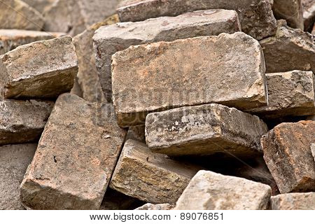 Pile Of Old Used Bricks As Construction Material