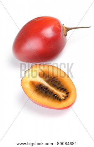 Close up of tamarillo on white background