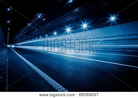 speeding car through the tunnel.