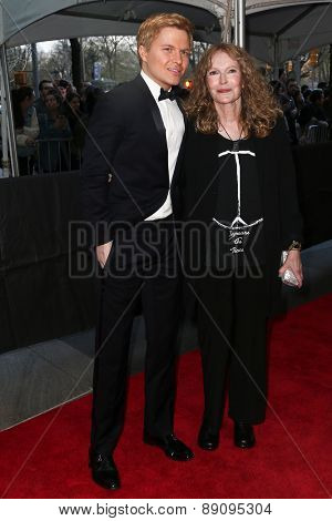 NEW YORK-APR 21: Ronan Farrow (L) and mother Mia Farrow attend the 2015 Time 100 Gala at Frederick P. Rose Hall, Jazz at Lincoln Center on April 21, 2015 in New York City.