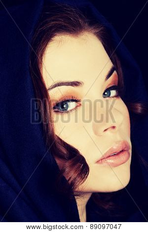 Young beautiful woman wearing headkerchief