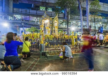 People At Famous Erawan Shrine In Bangkok