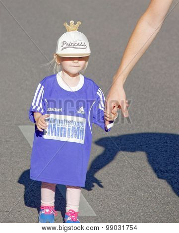 Cute Young Blonde Girl Running
