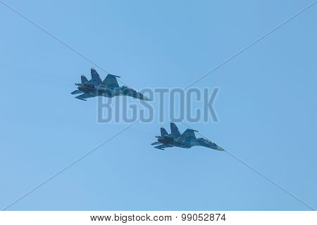 Crimea - 26 July 2015: parade in honor of the Day Russian Navy in Sevastopol. Flight Su-30 over the bay of the city