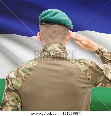 National Military Forces With Flag On Background Conceptual Series - Lesotho
