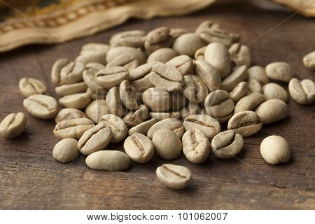  Heap of Indian Malabar green unroasted coffee beans