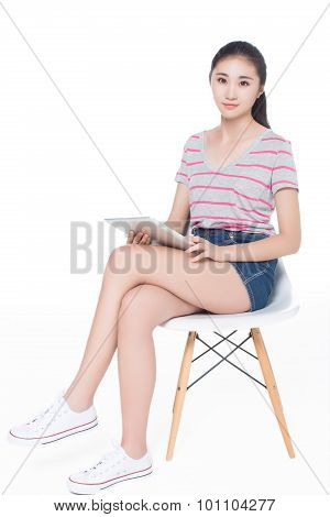 Girl Sitting On A Chair