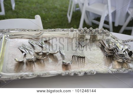 Silver tray with silverware