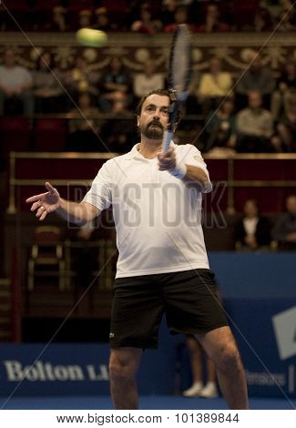 LONDON, ENGLAND. 05 DECEMBER 2009 -   Henri Leconte (FRA) competing in the season finale to the ATP Champions Tour match during the AEGON Masters Tennis, Royal Albert Hall, London.