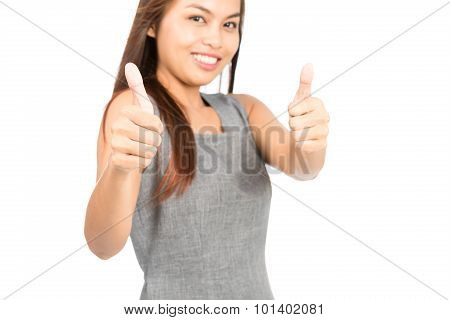 Focus On Thumbs Up Asian Woman Blurry Background