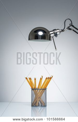 Lighting Up Orange Pencil Holder Stationery With Desk Lamp