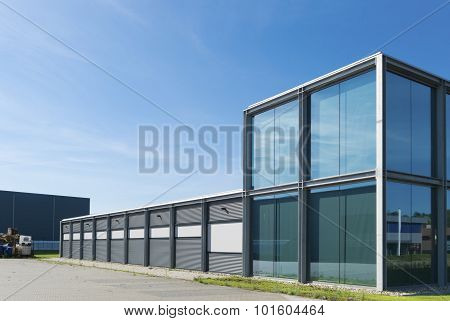 exterior of a modern office buillding with glass facade