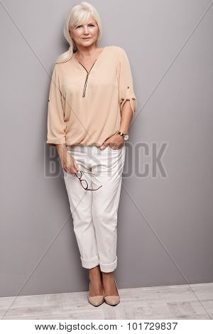 Nice Senior Woman In Fashionable Clothes.