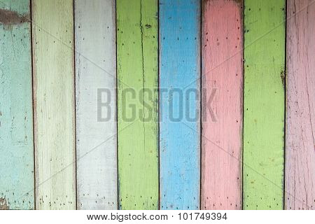 Old colorful vintage wood wallpaper background.