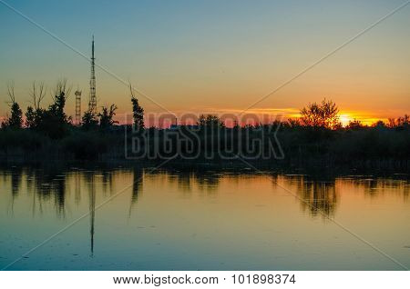 Sunset over calm lake
