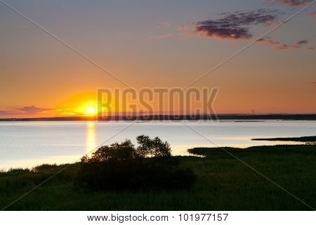 Sunset over the lake Lebsko in Poland