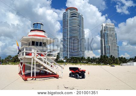 Lifeguard stand and luxury condominium towers overlooking the beach at Soouthpointe Park,Miami Beach,Florida