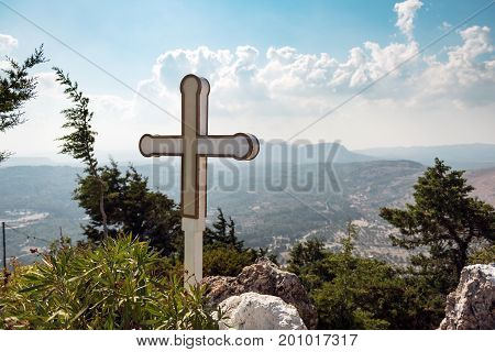 White cross at Tsampika church on Rhodes island, Greece