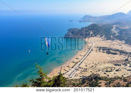 Aerial view on Tsampika sand beach and lagoon with clear blue water at Rhodes island, Greece.