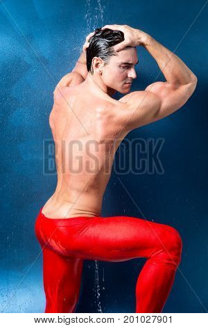 The hot guy is taking a warm shower