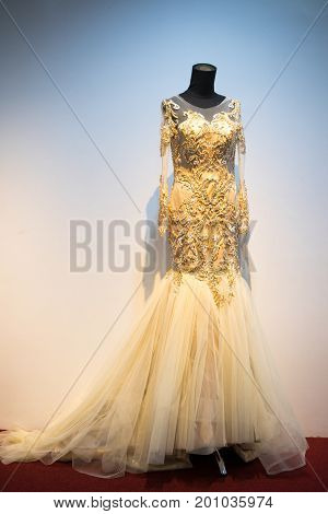 Wedding dress gown on mannequin in bridal gown. Bride's morning wedding preparation concept