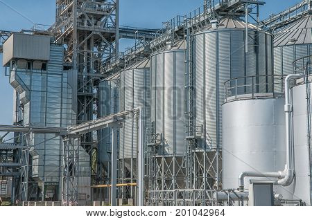 Galvanised Iron grain silos on a farm in Eastern Europe