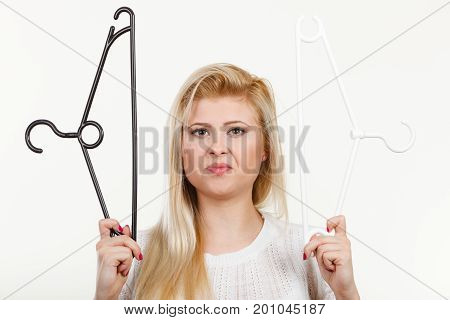 Woman Holding Clothes Hanger