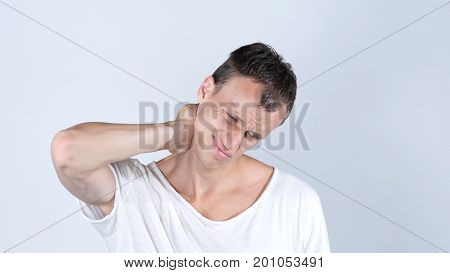 Businessman Neck Pain After Working In The Office Too Long Time, Neckache