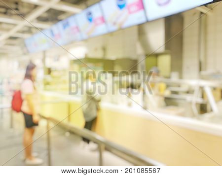 Blurred Image Of People Queue Up Waiting In Line To Buy Fast Food In Fastfood Store Or Seflservice R