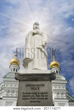 Great princess Olga's monument with Kiev-Pechersk Lavra Church on the background photo. The inscription on the monument is that Russian people believe she will be the first representative of Kyiv Rus to enter the kingdom of heaven.