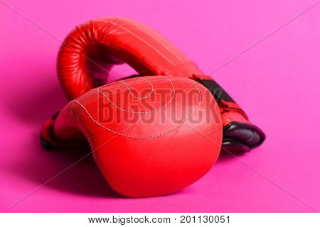 Pair Of Shiny Boxing Gloves In Bright Red Color