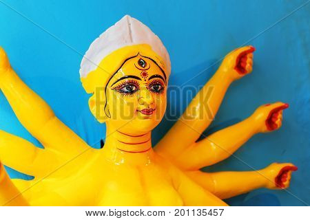 KOLKATA WEST BENGAL INDIA - 25 SEPTEMBER 2016: Clay idol of Goddess Durga under preparation for "Durga Puja' festival in Kumartuli Kolkata. Biggest festival of Hinduism.