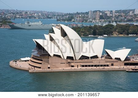 SYDNEY,NSW,AUSTRALIA-NOVEMBER 20,2016: Sydney Opera House at Bennelong Point with nautical vessels in Sydney, Australia